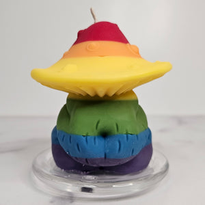 Colorful mushroom candle on a white background